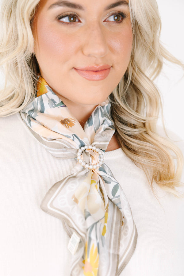 Plus Size gold-finished scarf ring with a circular pearl design.