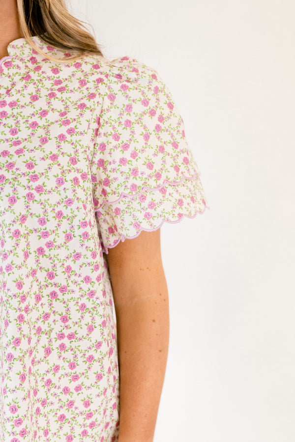 Chic Soul plus size clothing, white short sleeve top with purple and green floral print and scallop trim sleeves and v-neckline