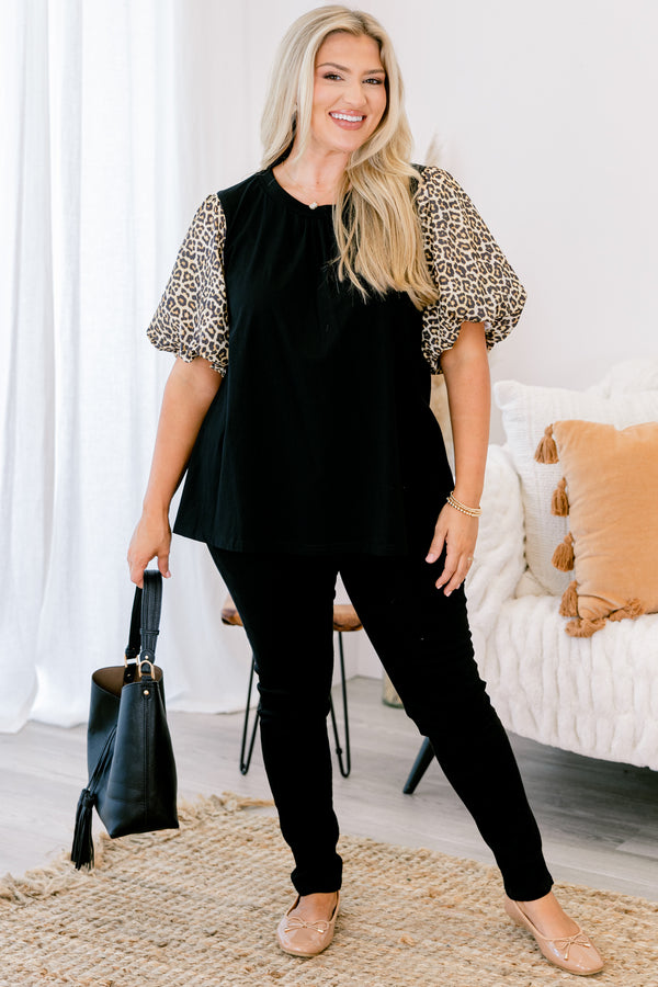 Chic soul plus size clothing, black top with bubble sleeves that have a leopard print on them 