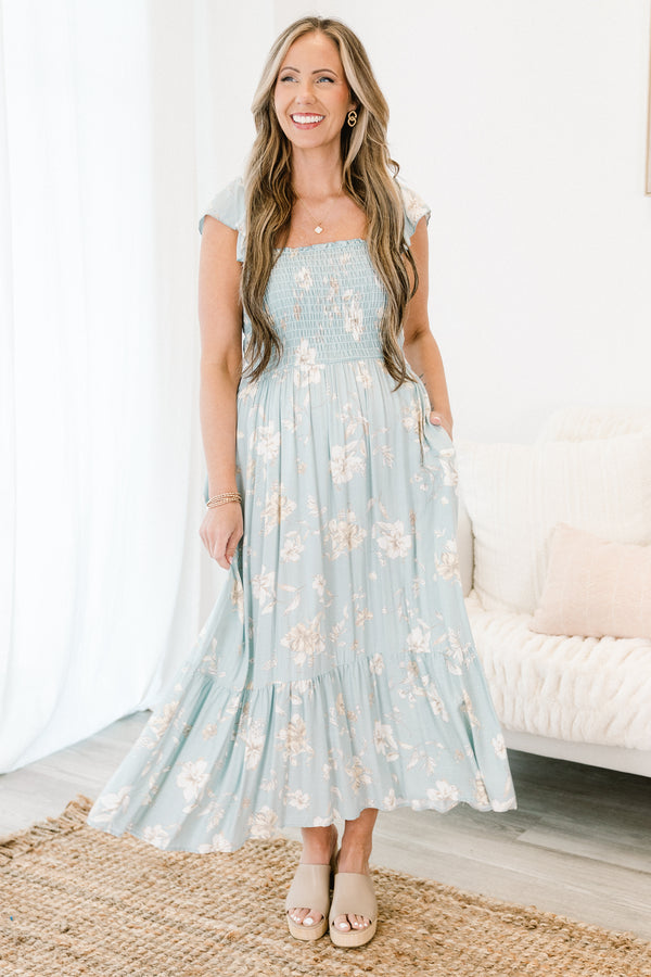 Chic Soul plus size clothing, light blue thick strap flowy ruffled maxi dress with a smocked bodice with a square-neckline and an ivory subtle floral pattern 