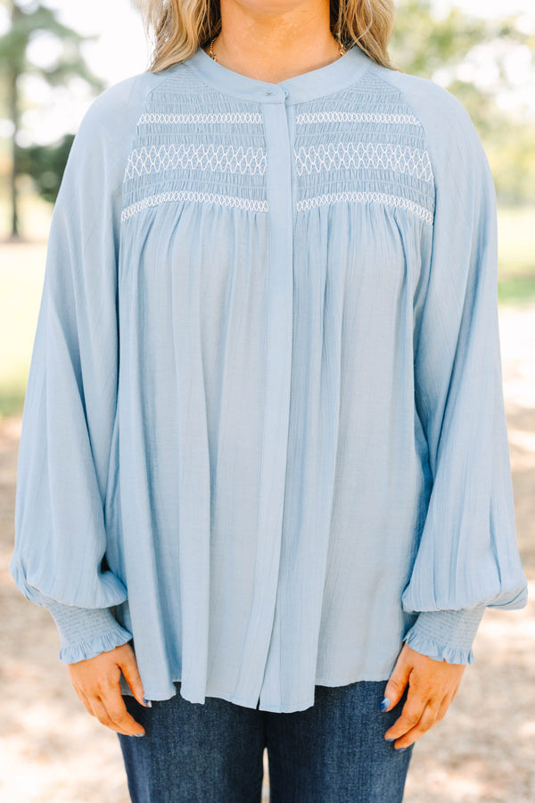 Plus size Jumping Ahead Top in chambray blue with smocked yoke, flowy fit, and balloon sleeves.