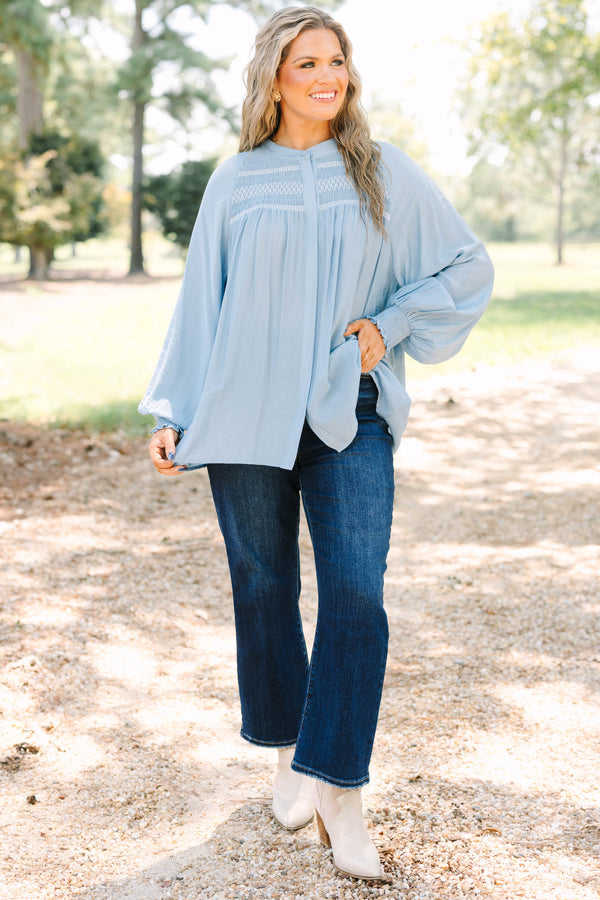 Plus size Jumping Ahead Top in chambray blue with smocked yoke, flowy fit, and balloon sleeves.