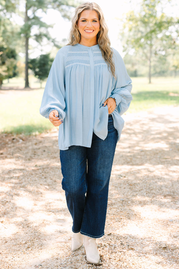 Plus size Jumping Ahead Top in chambray blue with smocked yoke, flowy fit, and balloon sleeves.