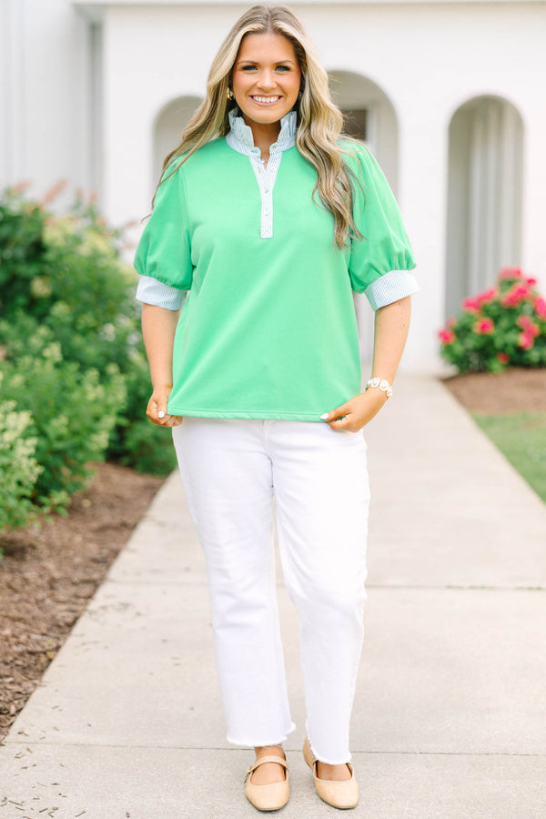 Plus size green top with blue and white striped contrast on neckline and sleeves