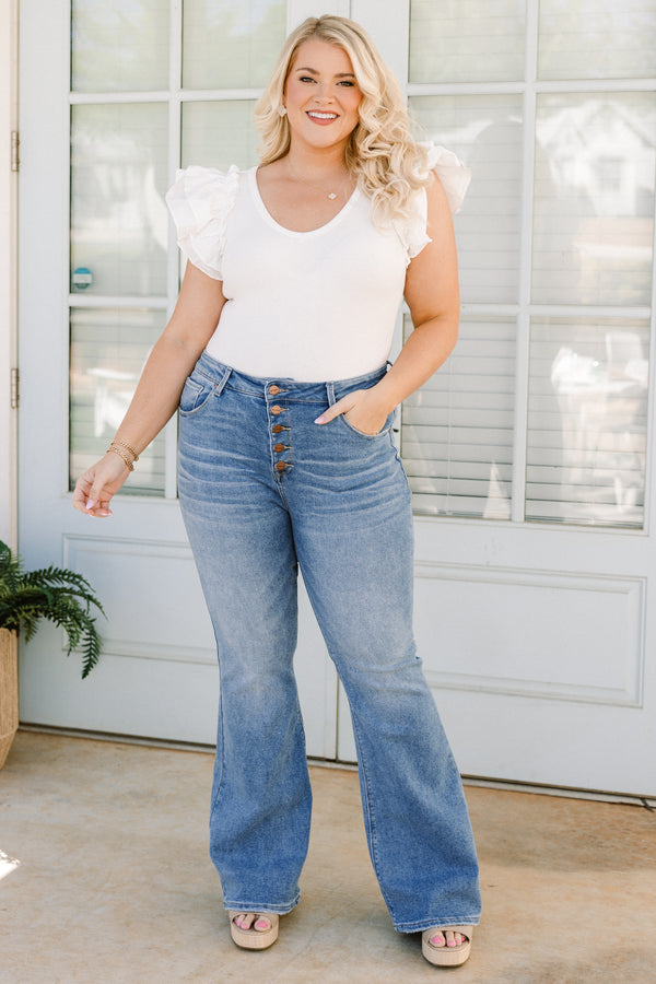 Chic Soul plus size clothing, high-waisted medium wash denim blue jeans with a straight boot-cut with a bronze button detailing 