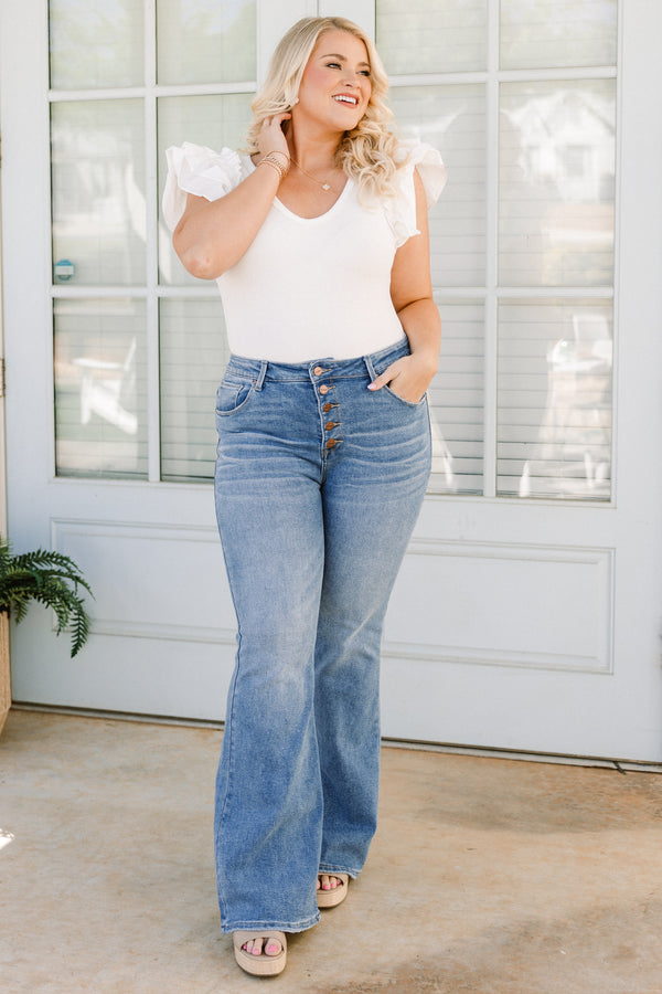 Chic Soul plus size clothing, high-waisted medium wash denim blue jeans with a straight boot-cut with a bronze button detailing 
