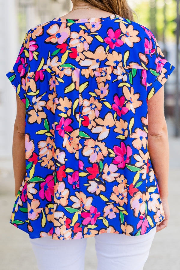 Chic Soul plus size clothing, short sleeve blue top with small v-neckline and multi-colored floral pattern