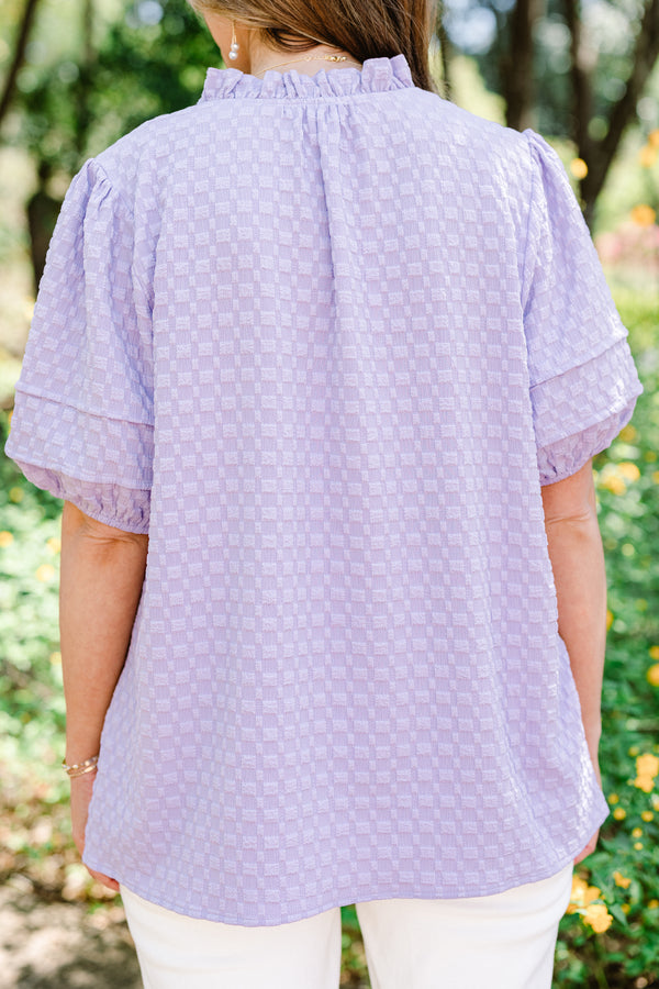 Chic Soul plus size clothing, short-puffed-sleeve light purple top with a textured spotted material and a split-v-neckline with ruffles along the neckline