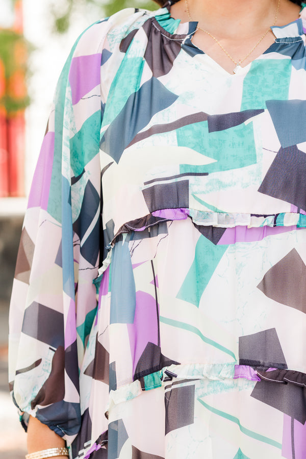 Chic Soul plus size clothing, long-sleeve ruffled purple multi-colored babydoll dress with smocked v-neckline and white and purple geometric abstract pattern