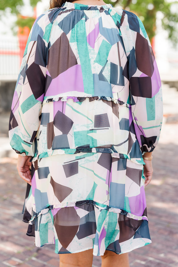 Chic Soul plus size clothing, long-sleeve ruffled purple multi-colored babydoll dress with smocked v-neckline and white and purple geometric abstract pattern