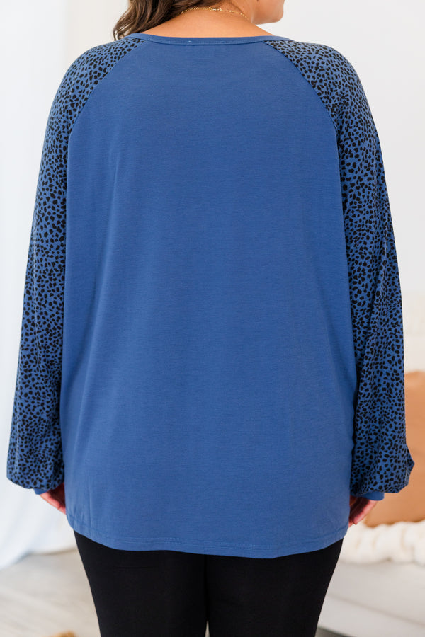 Chic Soul plus size clothing, blue long sleeve flowy top with round neckline with black dotted sleeves with cuff detail on sleeves