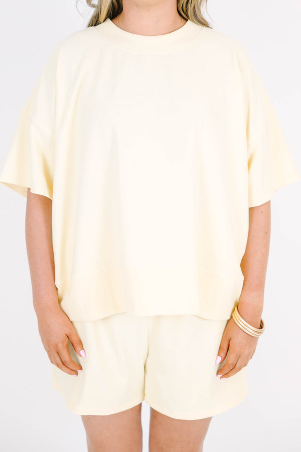 Plus Size banana yellow two-piece set with a short-sleeve ribbed top and matching pull-on shorts.
