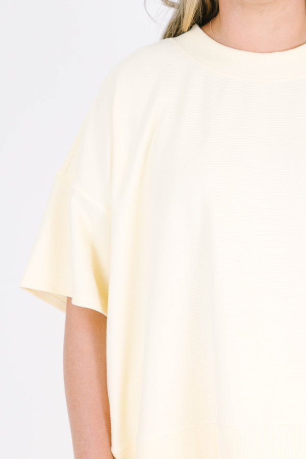 Plus Size banana yellow two-piece set with a short-sleeve ribbed top and matching pull-on shorts.