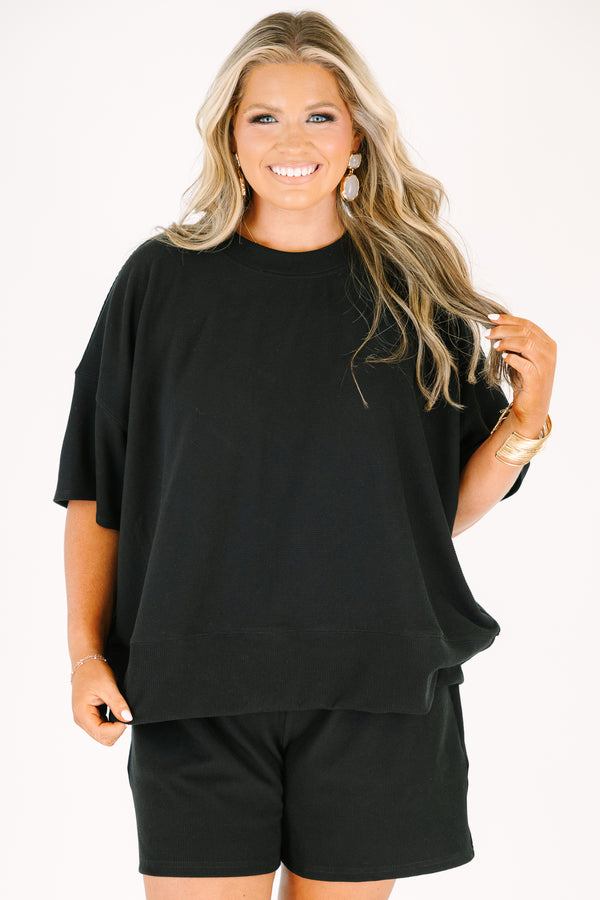 Plus Size black two-piece set featuring a short-sleeve ribbed top and matching pull-on shorts.