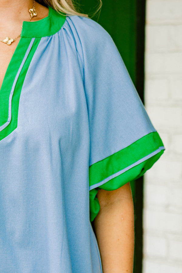 Chic Soul plus size clothing, blue short sleeve mini dress with v cutout along neckline with puff sleeves with kelly green trim along sleeves, neckline, and bottom