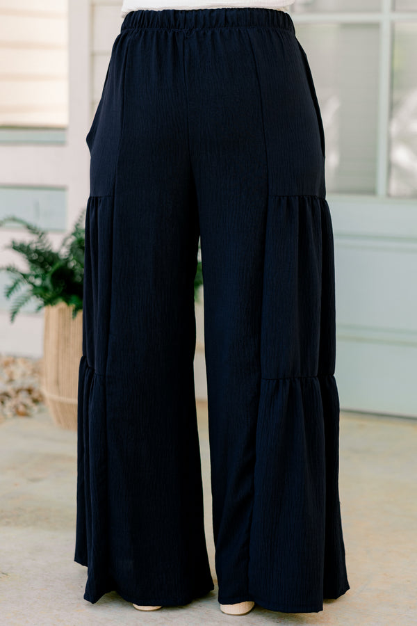 Chic Soul plus size clothing, high-waisted navy blue ruffled flowy pants with an elastic waistband 