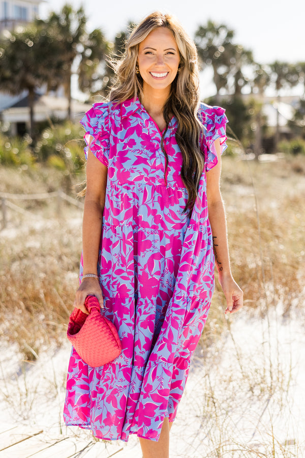 Chic Soul plus size clothing, purple midi dress with a fuchsia floral pattern, flutter sleeves, and a v-neck 
