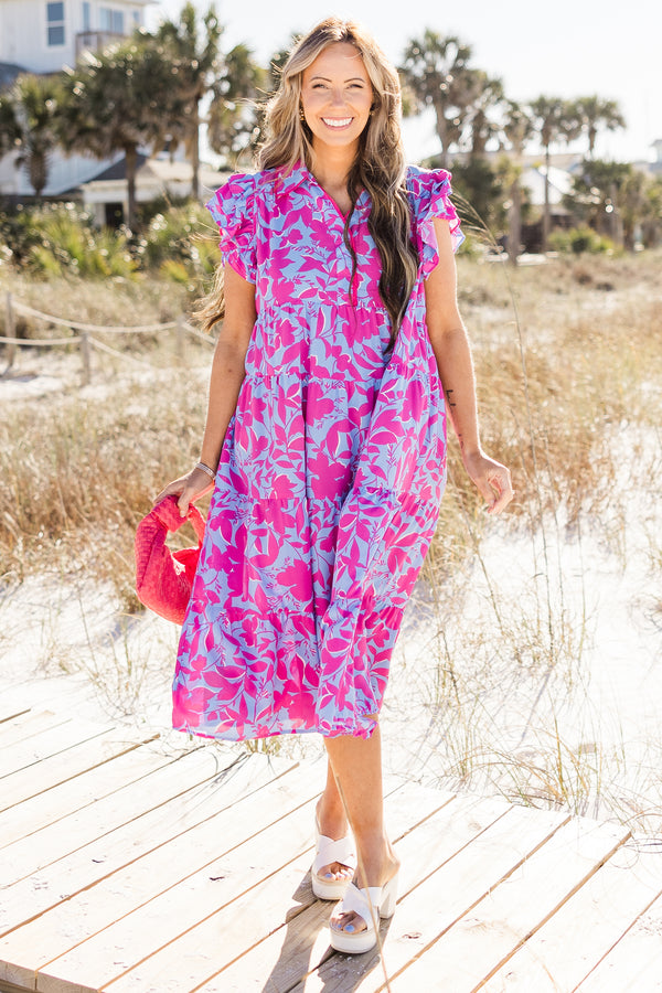 Chic Soul plus size clothing, purple midi dress with a fuchsia floral pattern, flutter sleeves, and a v-neck 