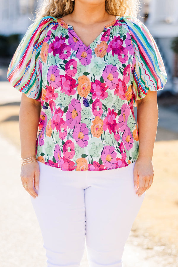 Chic Soul plus size clothing, multi color floral top with v-neckline and puff sleeves that are striped with patterns