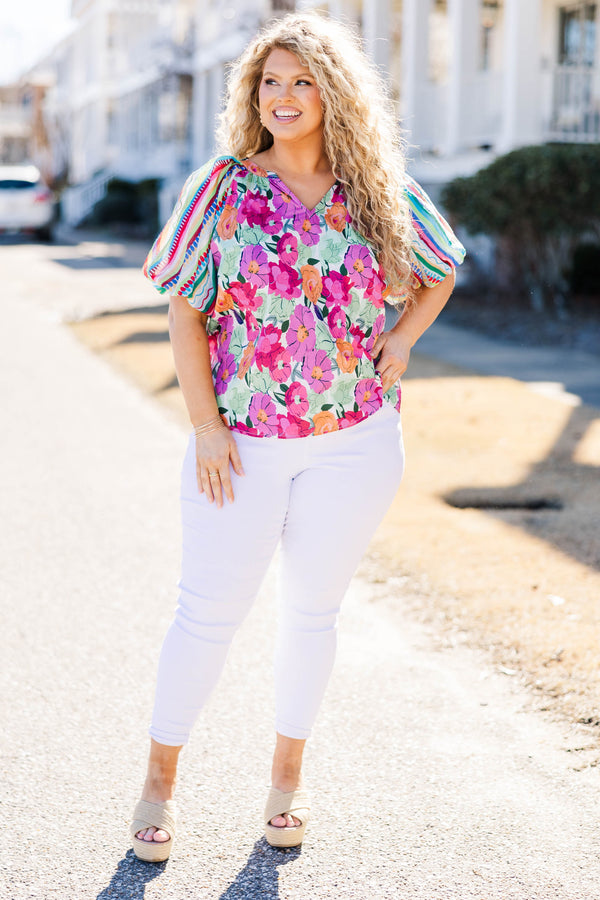 Chic Soul plus size clothing, multi color floral top with v-neckline and puff sleeves that are striped with patterns