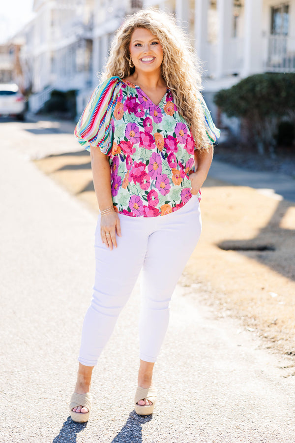Chic Soul plus size clothing, multi color floral top with v-neckline and puff sleeves that are striped with patterns