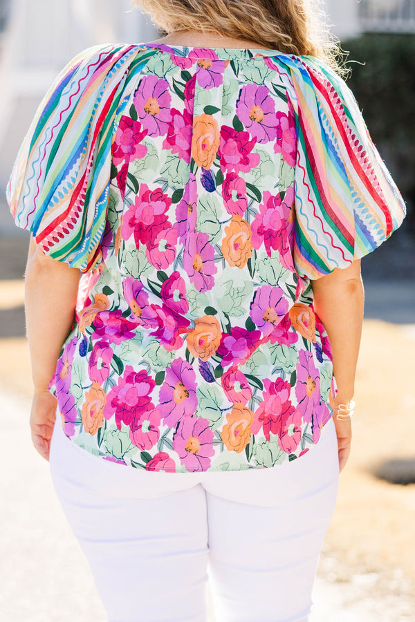 Chic Soul plus size clothing, multi color floral top with v-neckline and puff sleeves that are striped with patterns