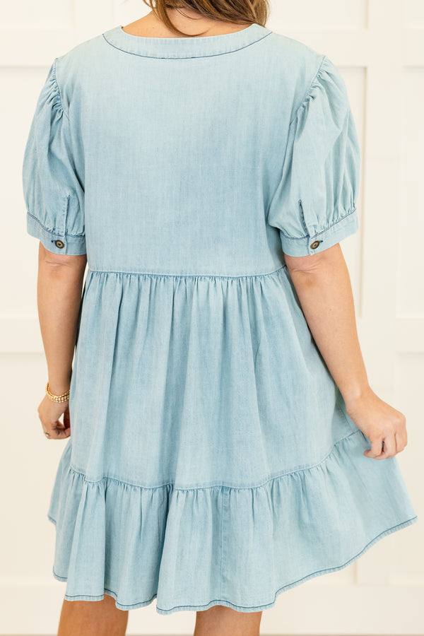 Chic Soul plus size clothing, short-puffed-sleeve blue light wash denim ruffled baby doll dress with a v-neckline and a pocket on the bodice 