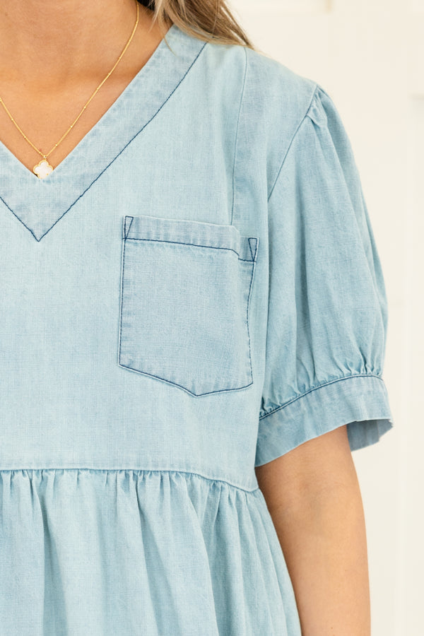 Chic Soul plus size clothing, short-puffed-sleeve blue light wash denim ruffled baby doll dress with a v-neckline and a pocket on the bodice 