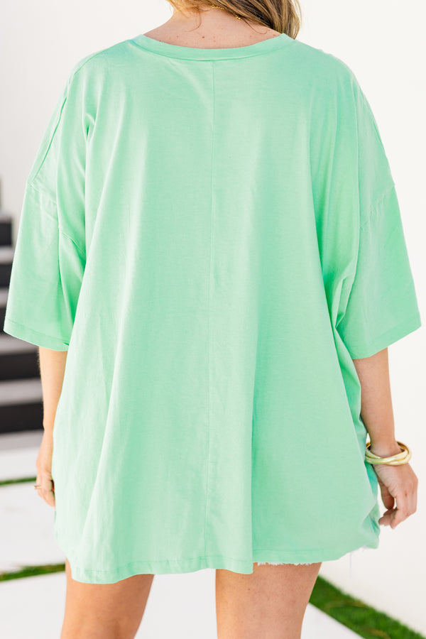 Chic Soul plus size clothing, short-sleeve green mint boyfriend tee with a high-scoop-neckline and a blue checkered graphic print with pink lettering stating 