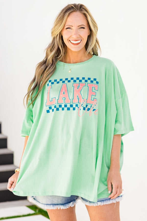 Chic Soul plus size clothing, short-sleeve green mint boyfriend tee with a high-scoop-neckline and a blue checkered graphic print with pink lettering stating 