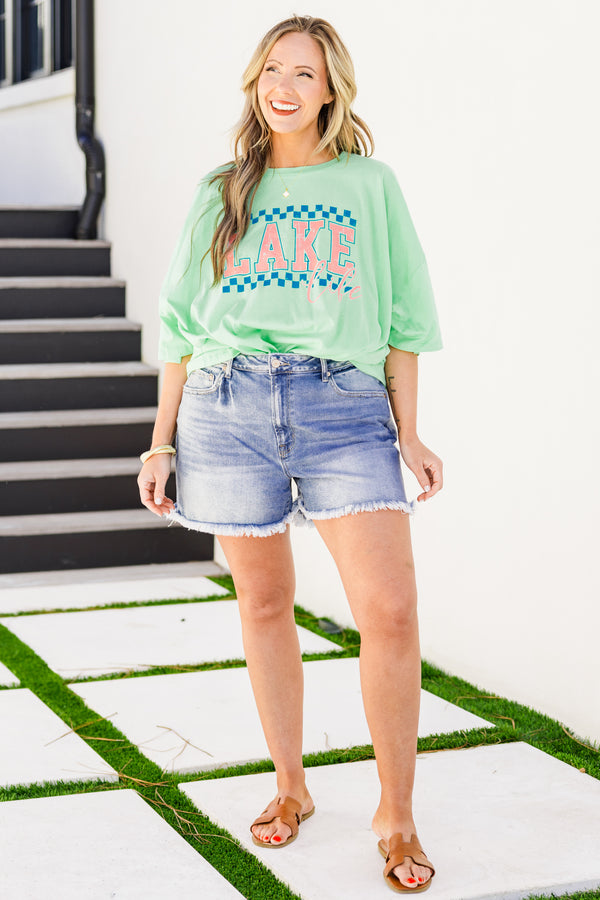 Chic Soul plus size clothing, short-sleeve green mint boyfriend tee with a high-scoop-neckline and a blue checkered graphic print with pink lettering stating 