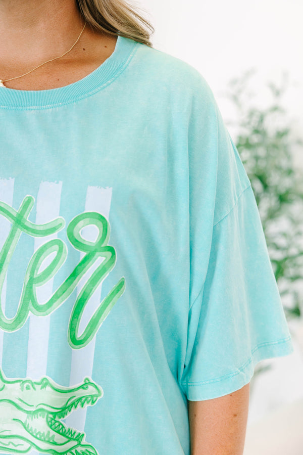 Plus Size mint acid wash relaxed tee with a green alligator graphic and white stripes.