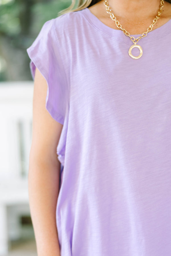Plus Size lavender sleeveless top with a crew neckline and ruffled shoulder details.
