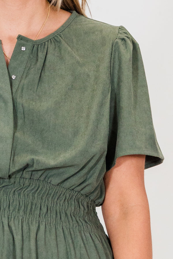 Chic Soul plus size clothing, green short sleeve mini dress with button up detail and synched waist with ruffle along the bottom