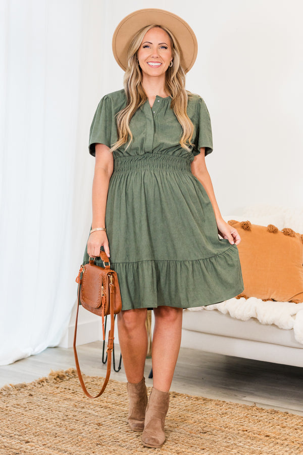 Chic Soul plus size clothing, green short sleeve mini dress with button up detail and synched waist with ruffle along the bottom