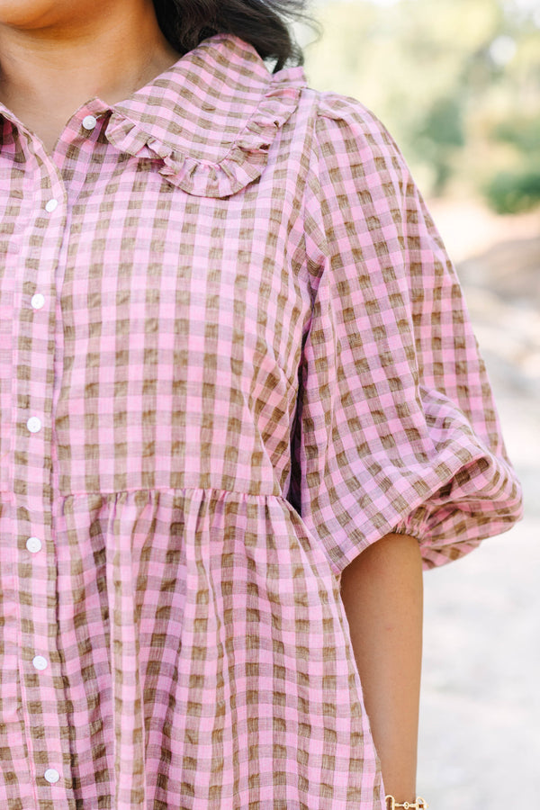 Plus Size mauve and brown gingham babydoll dress with puff sleeves, a collar, and button-down front.