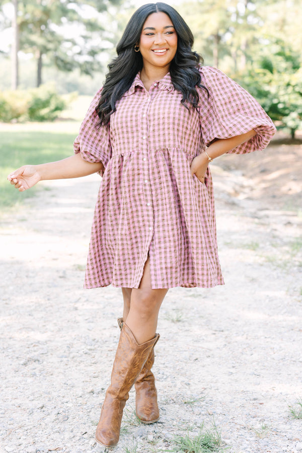 Plus Size mauve and brown gingham babydoll dress with puff sleeves, a collar, and button-down front.