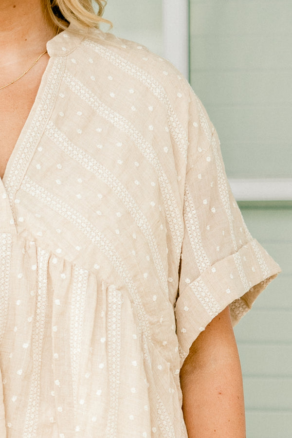 Chic Soul plus size clothing, taupe baby doll top with short sleeves and a polka dot pattern with stripes as well as cuffs at the end of the sleeves 