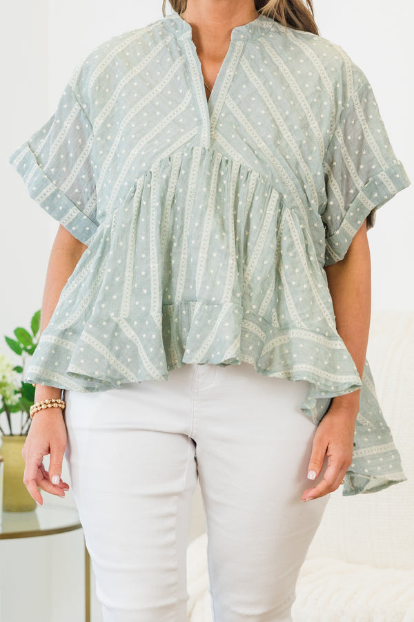 Chic Soul plus size clothing, short-cuffed-sleeve teal green ruffled baby doll top with a split-v-neckline and a high-low hemline with a striped polka dotted abstract pattern 