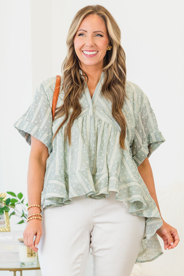 Chic Soul plus size clothing, short-cuffed-sleeve teal green ruffled baby doll top with a split-v-neckline and a high-low hemline with a striped polka dotted abstract pattern 
