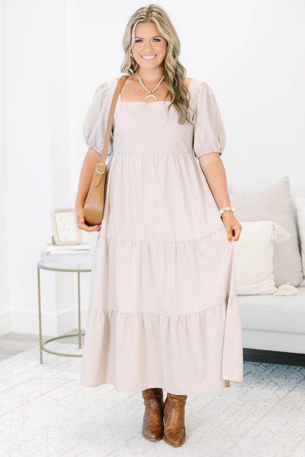 Plus Size ivory striped tiered maxi dress with a square neckline and puff sleeves.