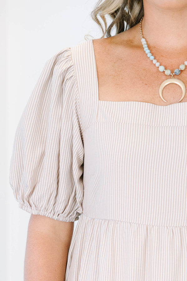 Plus Size ivory striped tiered maxi dress with a square neckline and puff sleeves.