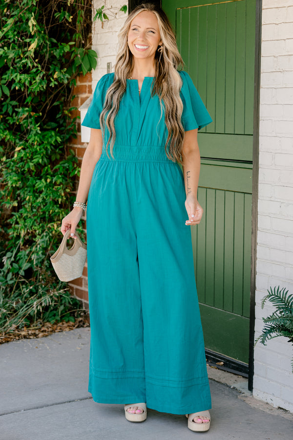 Chic Soul plus size clothing, jade jumpsuit with short sleeves a slight  v-neckline and a wide pant legs 