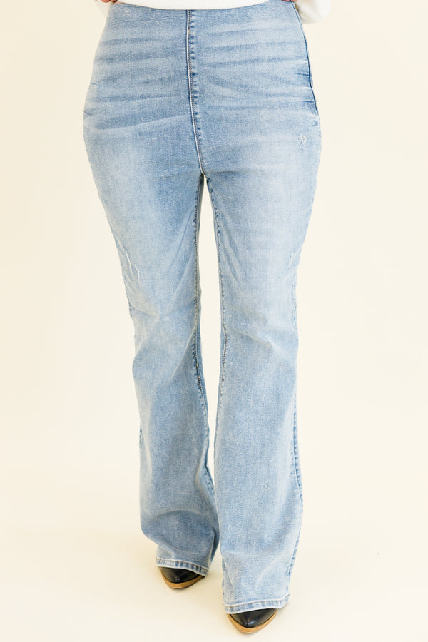 Chic Soul plus size clothing, high-waisted buttonless pull-on flare light wash jeggings with stitching along the middle and back pockets
