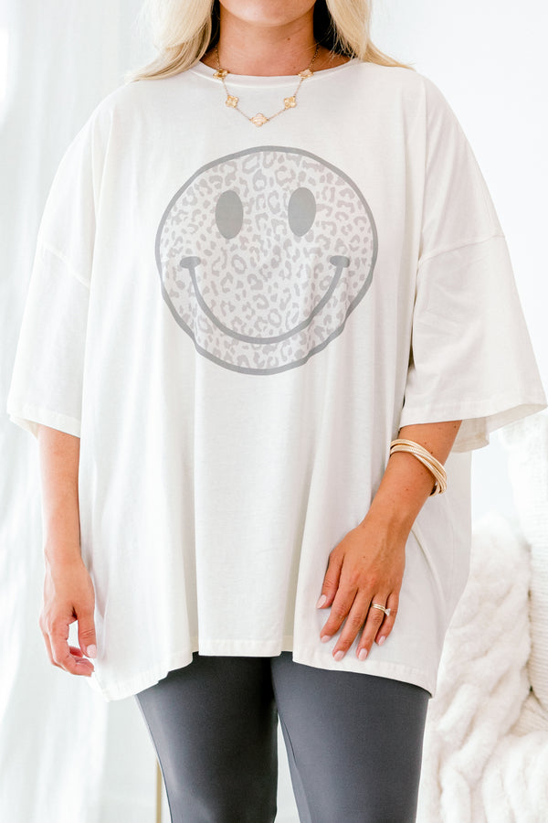 Chic Soul plus size clothing, Ivory Short sleeve graphic tee with a grey smiley face in the center of the shirt that is filled with a grey leopard pattern