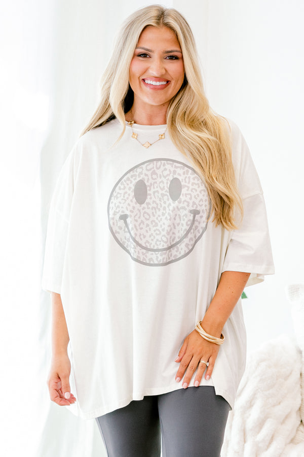 Chic Soul plus size clothing, Ivory Short sleeve graphic tee with a grey smiley face in the center of the shirt that is filled with a grey leopard pattern