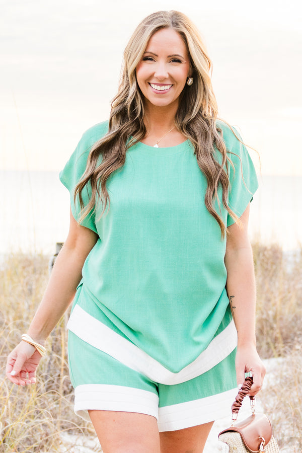Chic Soul plus size clothing, aqua short sleeve flowy top with round neckline with flowy short sleeves with white band along the bottom