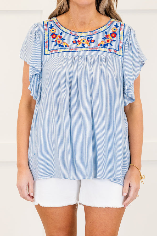 Chic Soul plus size clothing, short-flutter-sleeve denim blue flowy top with a high-scoop-neckline and a multi-colored embroidered floral pattern along the neckline 