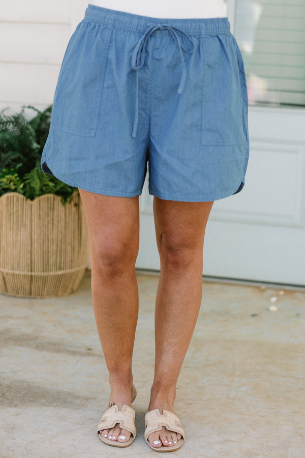 light denim drawstring shorts with drawstring waist and large front pockets