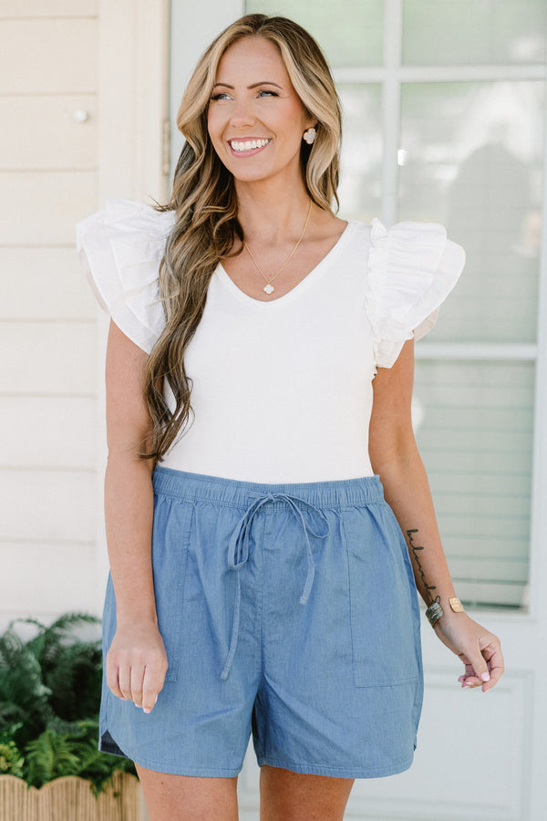 light denim drawstring shorts with drawstring waist and large front pockets